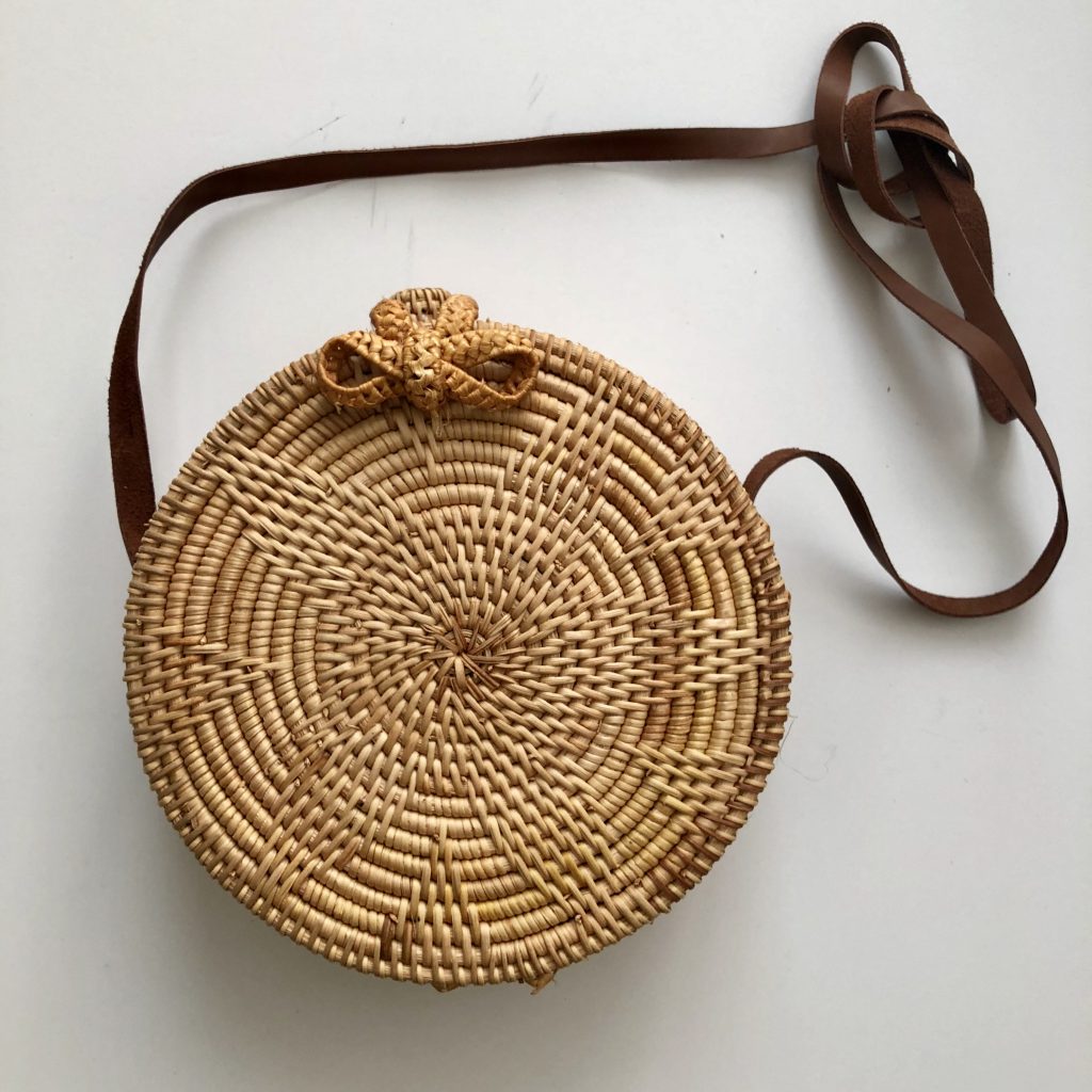 Round Rattan Bali Bag with Front Floral/Star Design - The Daily Belle